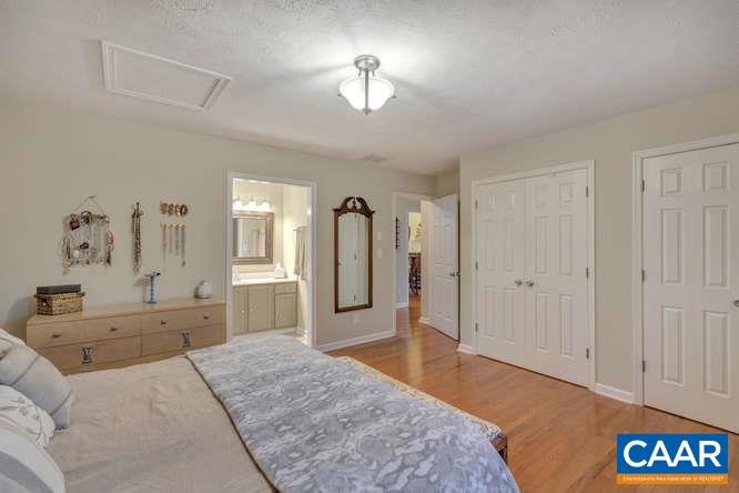 13 East Point Road Palmyra, VA 22963 - Photo 17 of 47 a spacious bedroom with a bed and a dresser