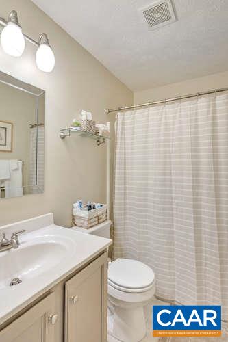 13 East Point Road Palmyra, VA 22963 - Photo 22 of 47 a bathroom with a sink a toilet and a mirror