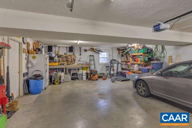 13 East Point Road Palmyra, VA 22963 - Photo 29 of 47 a view of a garage with a flat screen tv