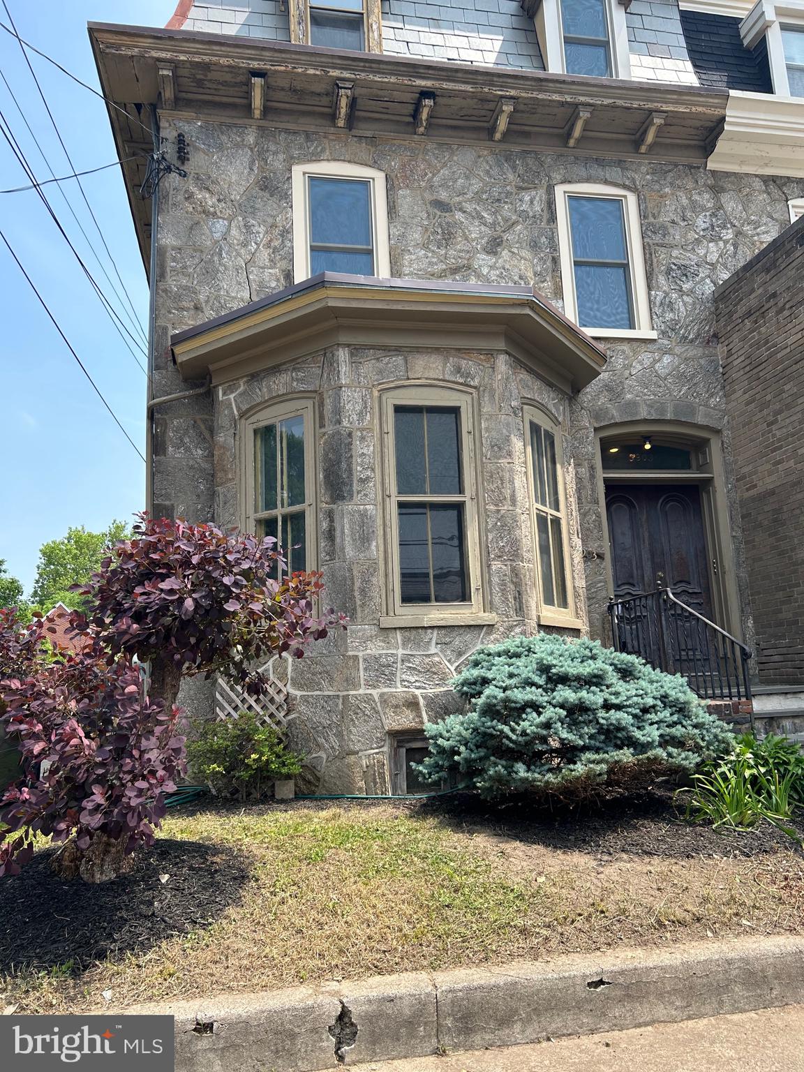 5903 Greene Street, Unit 3 Philadelphia, PA 19144 - Photo 2 of 19 a view of a house with a garden