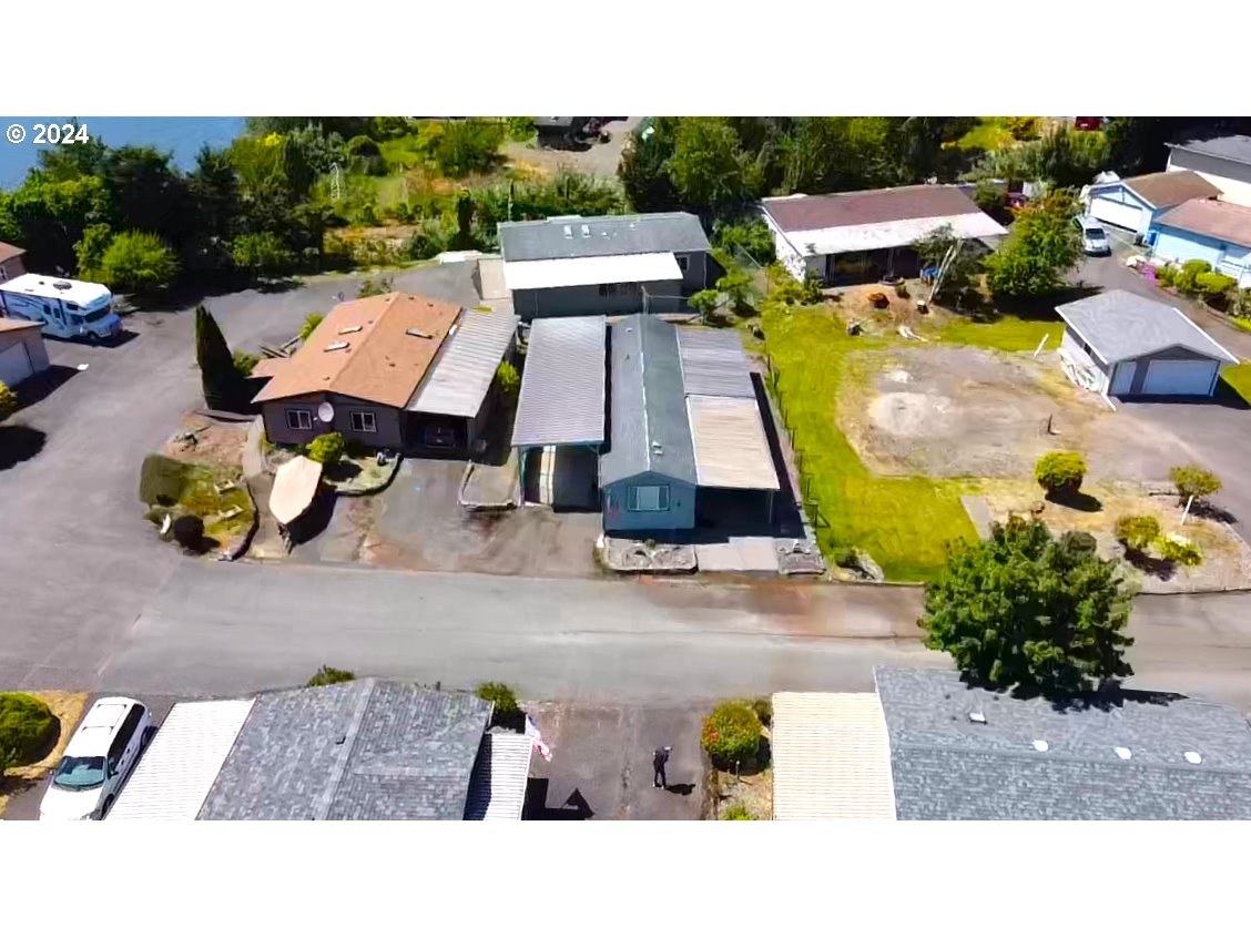 100 River Bend Road, Unit 5 Reedsport, OR 97467 - Photo 17 of 18 an aerial view of a house with a garden