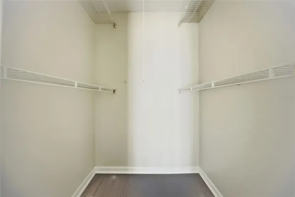 a view of an empty walk in closet