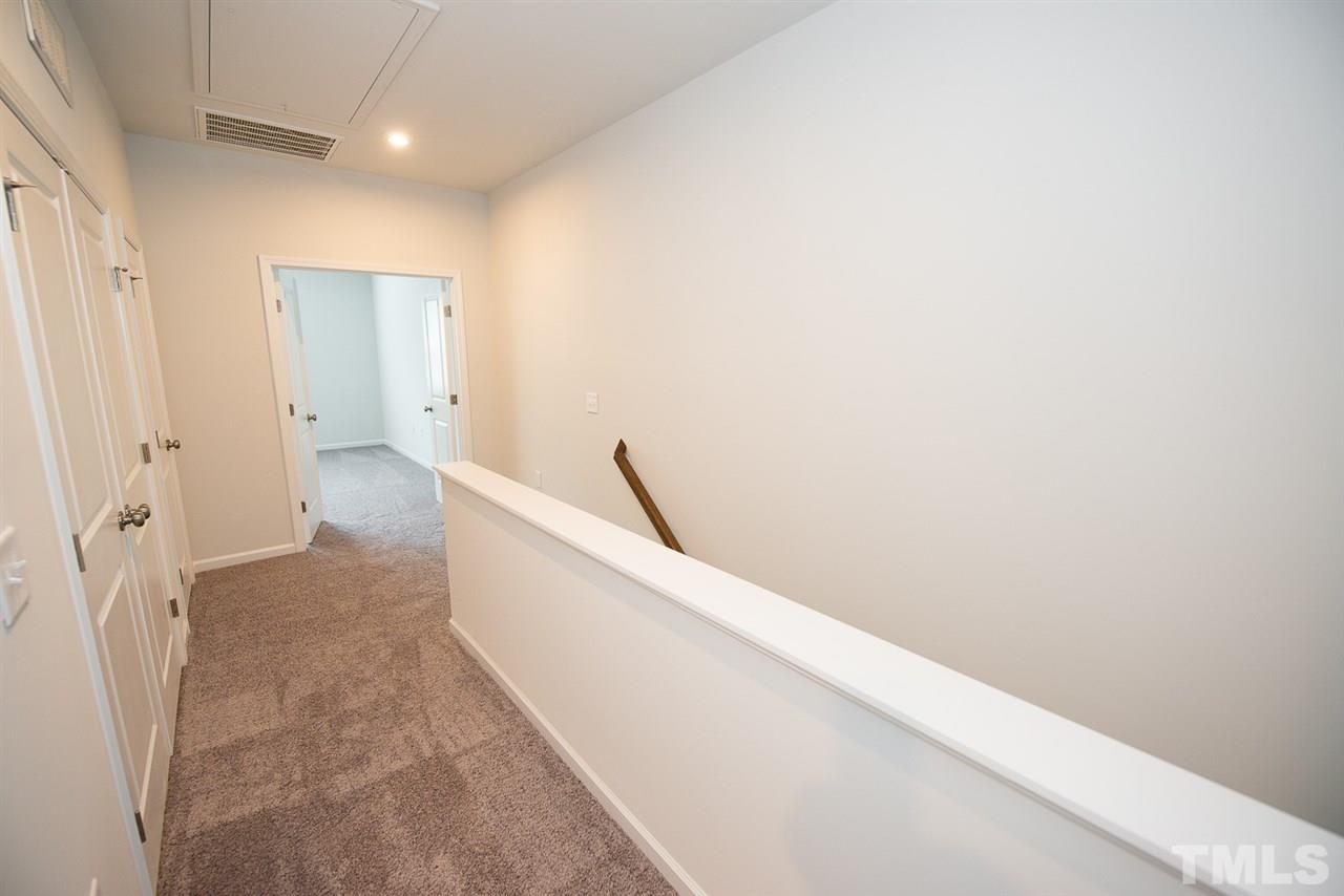3610 Water Mist Lane, Unit 30 Raleigh, NC 27604 - Photo 11 of 25 a view of hallway with stairs