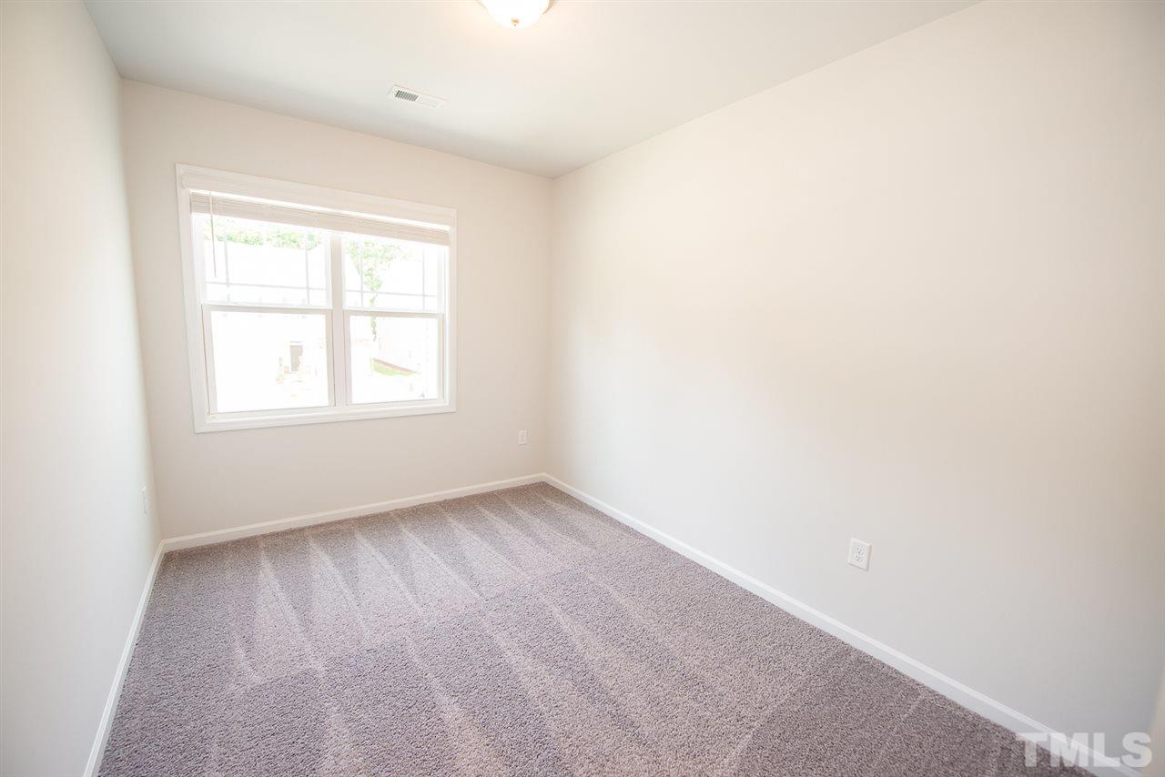 3610 Water Mist Lane, Unit 30 Raleigh, NC 27604 - Photo 15 of 25 an empty room with a window