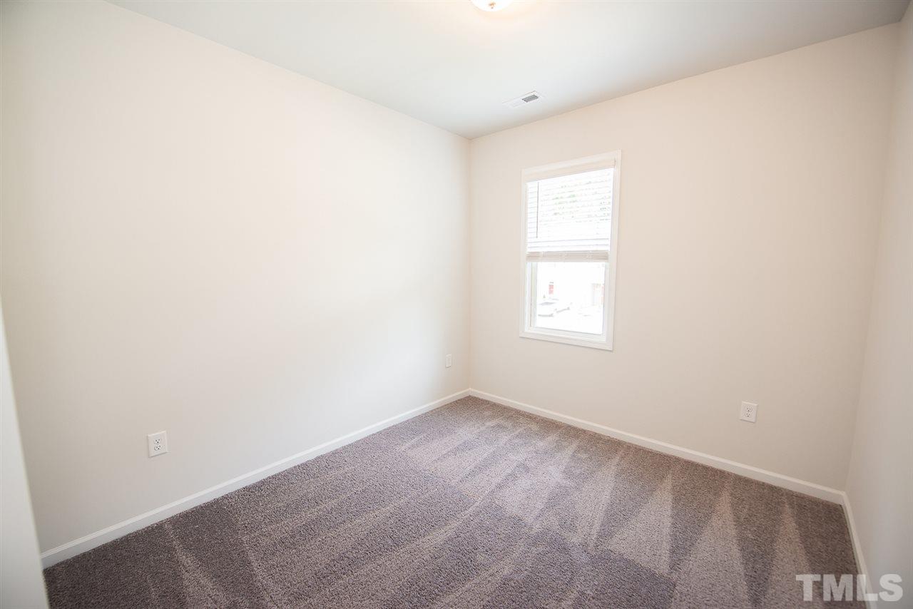 3610 Water Mist Lane, Unit 30 Raleigh, NC 27604 - Photo 16 of 25 a view of an empty room with a window