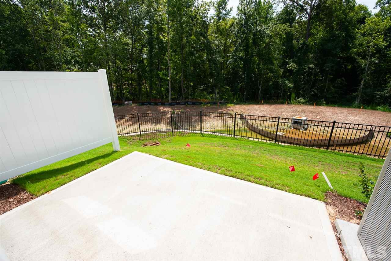 3610 Water Mist Lane, Unit 30 Raleigh, NC 27604 - Photo 19 of 25 a view of a backyard with swimming pool