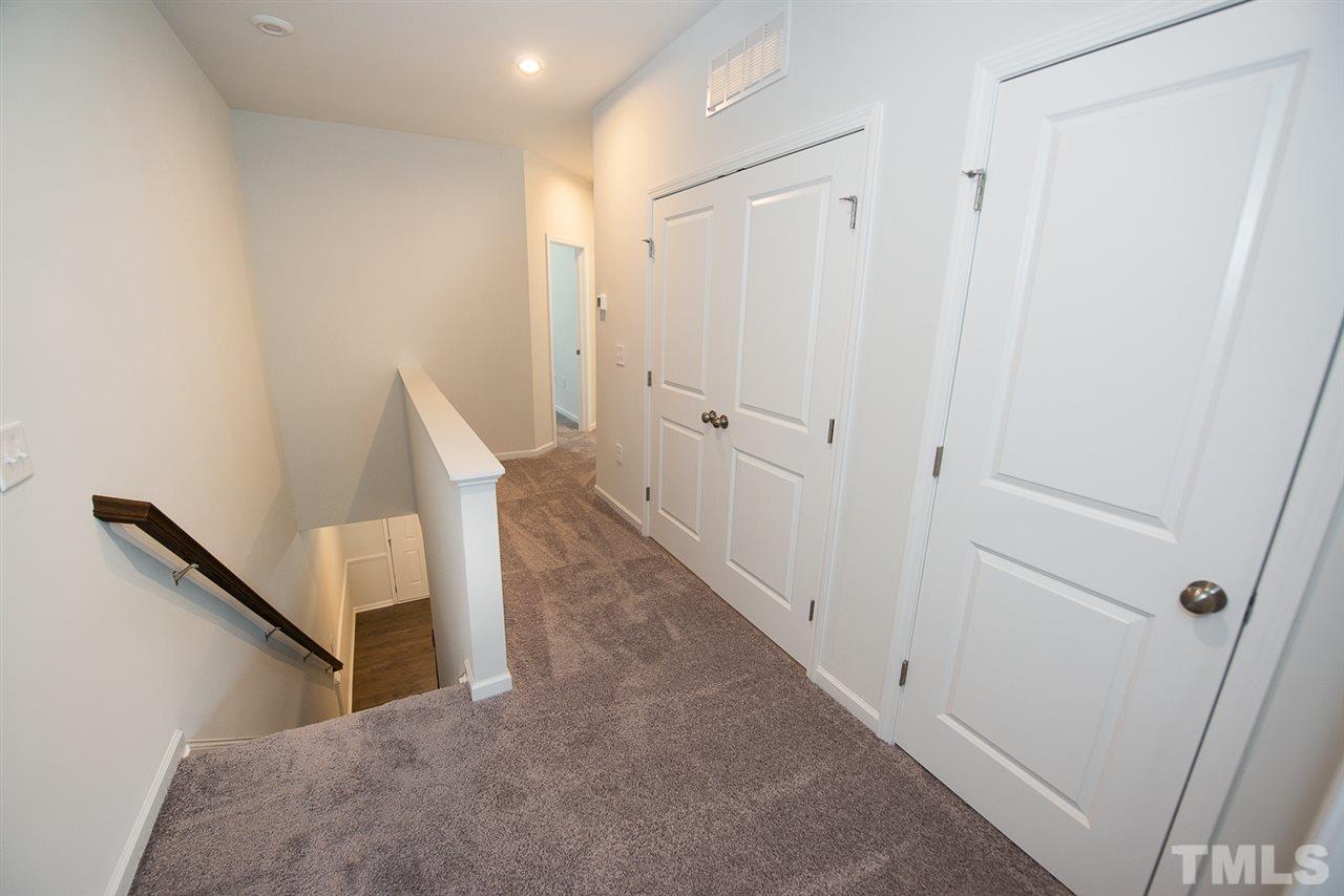 3610 Water Mist Lane, Unit 30 Raleigh, NC 27604 - Photo 10 of 25 a view of a hallway with staircase