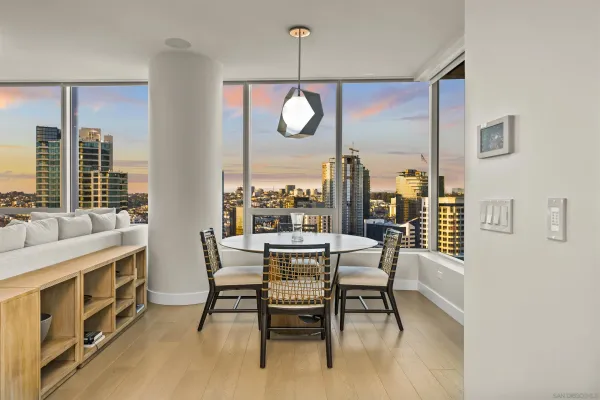 a view of a dining room with furniture window and outside view