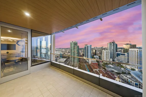 a view of a balcony with city view