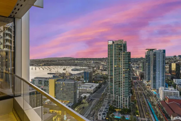 a view of a city from a balcony with city view
