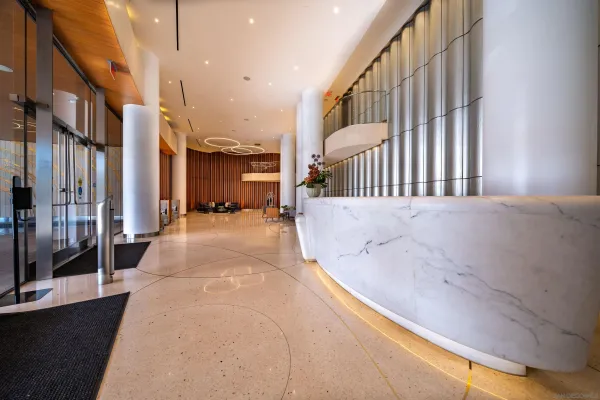 a view of a swimming pool with outdoor seating