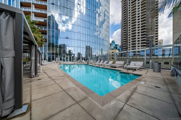 a view of a patio with swimming pool