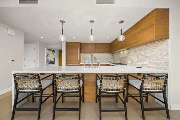 a kitchen with a table and chairs in it