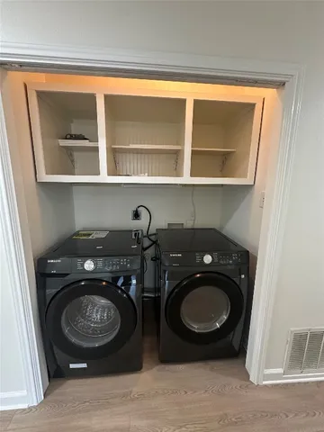 a bathroom with a toilet and a vanity