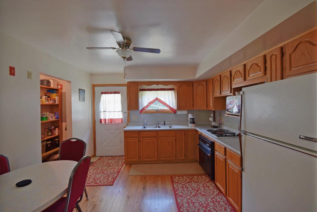 480 Bunker Hill Road Lagrange, ME 04453 - Photo 3 of 23 Eat-in Kitchen with custom oak cabinetry