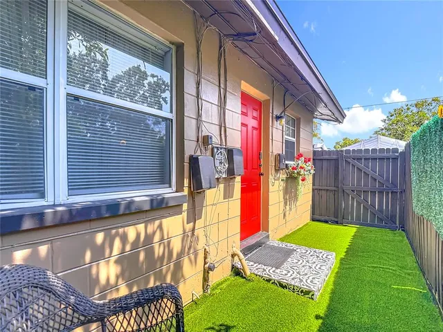 a view of yard with seating area and green space