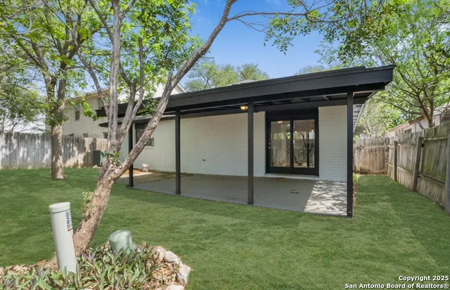 a house view with a garden space