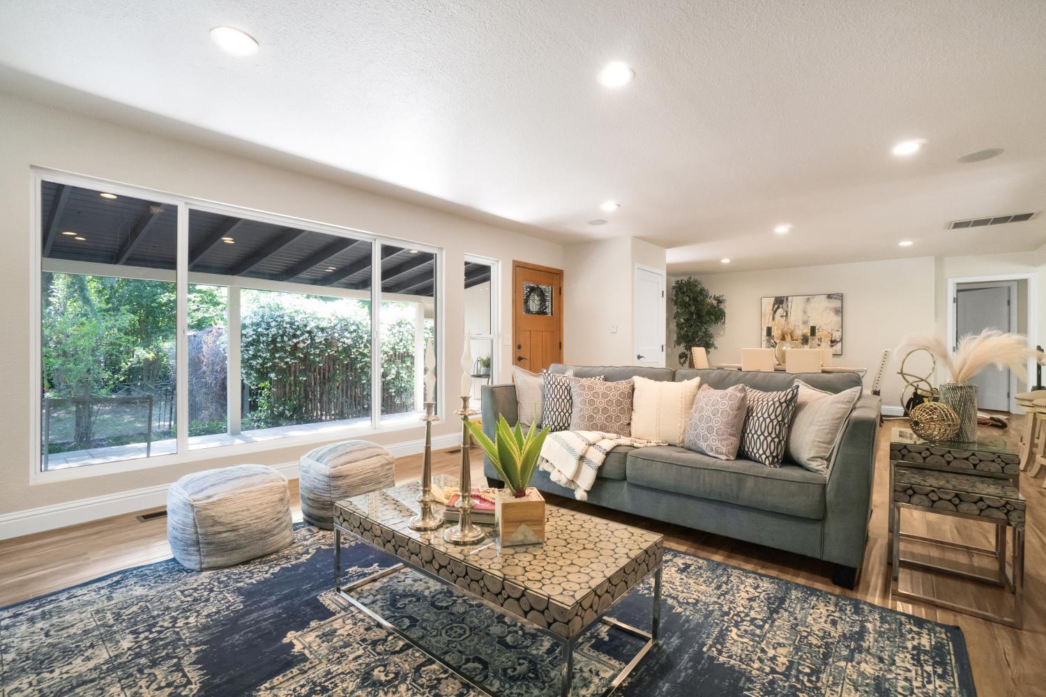 6299 Horseshoe Bar Road Loomis, CA 95650 - Photo 5 of 43 a living room with furniture and a large window