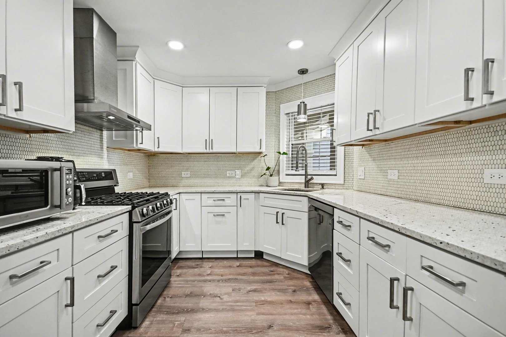850 Spring Creek Court Elk Grove Village, IL 60007 - Photo 13 of 26 a kitchen with granite countertop cabinets stainless steel appliances and a sink