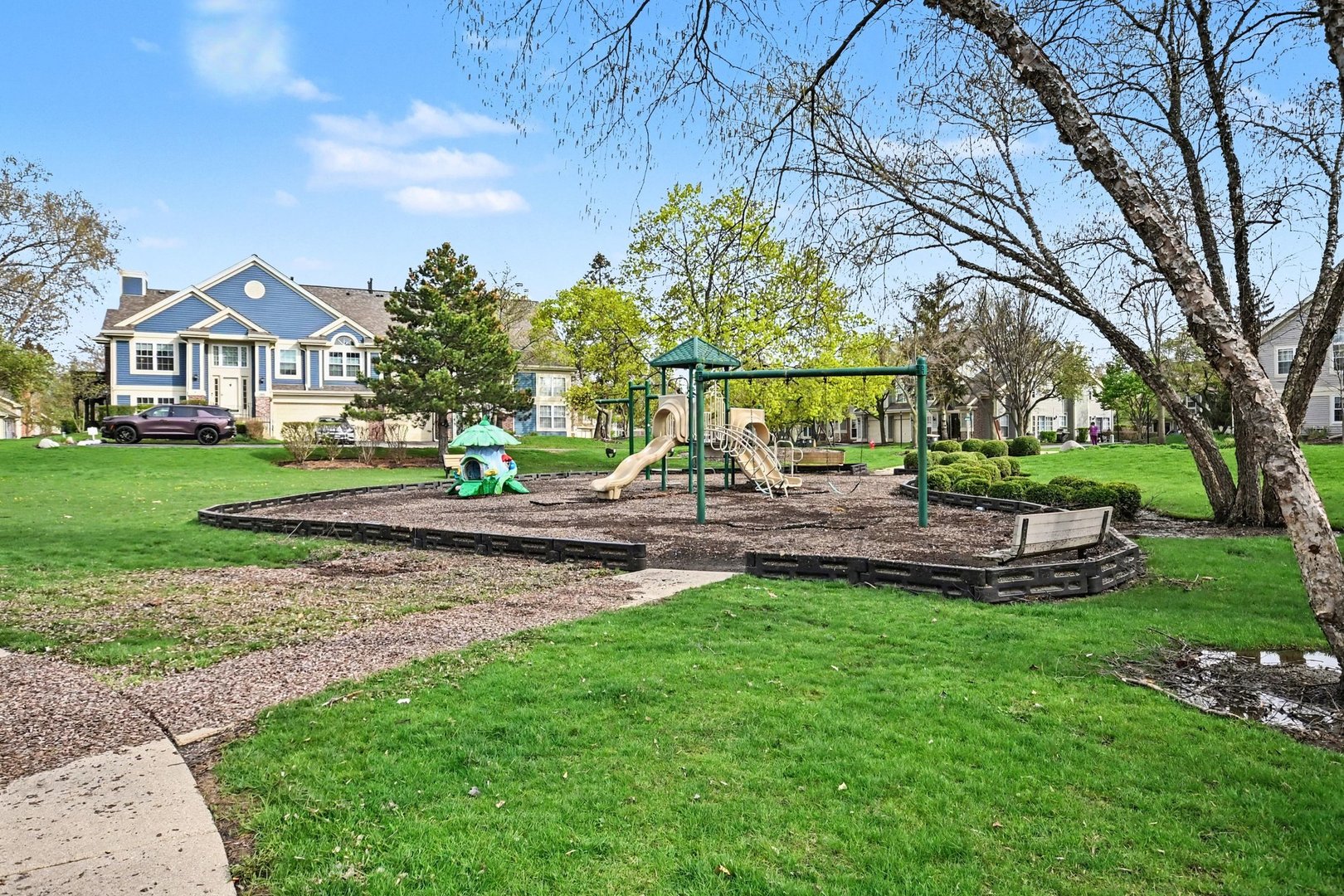 850 Spring Creek Court Elk Grove Village, IL 60007 - Photo 24 of 26 a view of house with outdoor space and garden