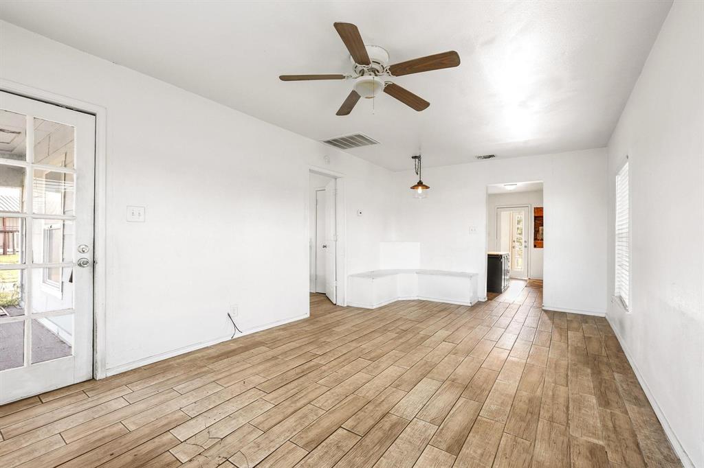 2092 County Road 5010 Blue Ridge, TX 75424 - Photo 11 of 28 a view of empty room with wooden floor and ceiling fan