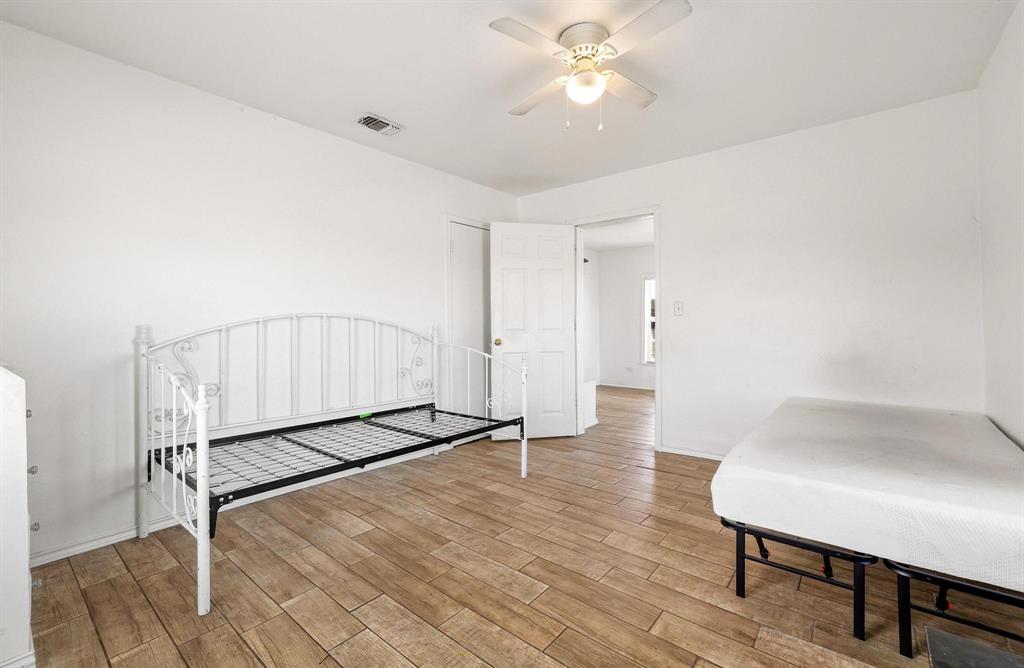 2092 County Road 5010 Blue Ridge, TX 75424 - Photo 19 of 28 a view of an empty room and wooden floor
