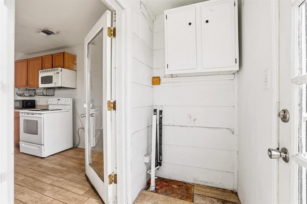 2092 County Road 5010 Blue Ridge, TX 75424 - Photo 22 of 28 a view of kitchen with white cabinets and white appliances