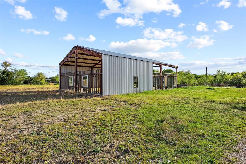 2092 County Road 5010 Blue Ridge, TX 75424 - Photo 23 of 28 a view of a house with a yard