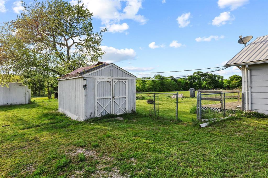 2092 County Road 5010 Blue Ridge, TX 75424 - Photo 24 of 28 a view of a backyard with a garden