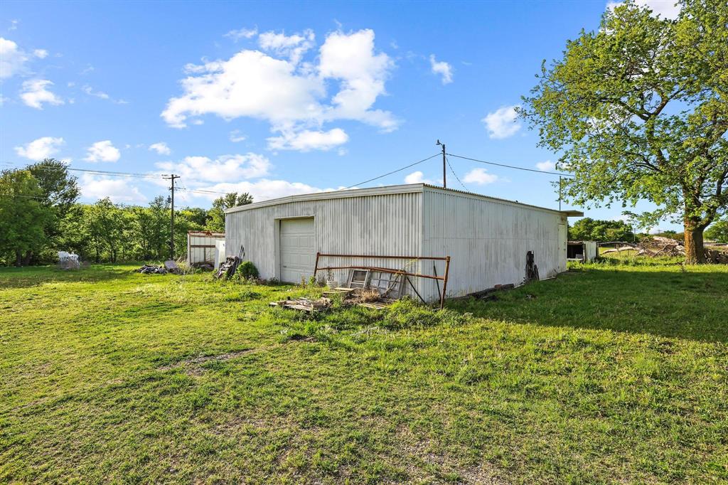 2092 County Road 5010 Blue Ridge, TX 75424 - Photo 26 of 28 a house view with a backyard space