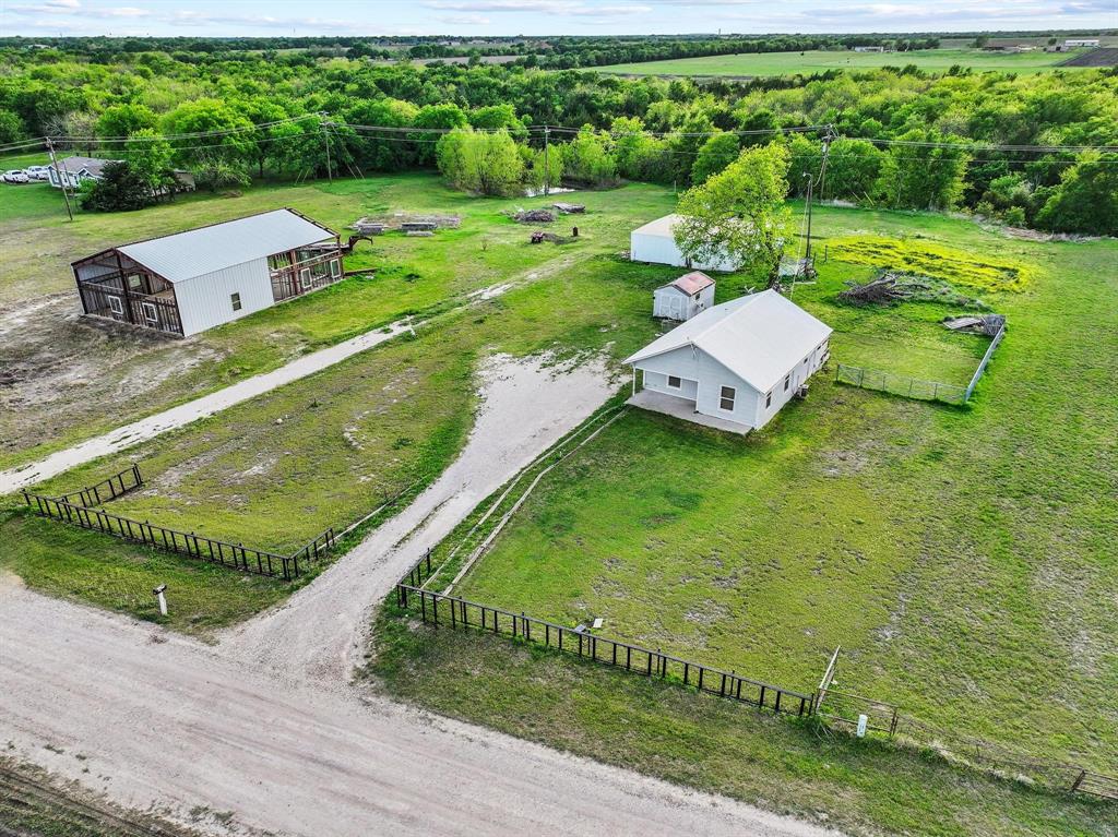 2092 County Road 5010 Blue Ridge, TX 75424 - Photo 3 of 28 swimming pool view with a garden