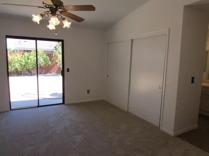 an empty room with a bathroom