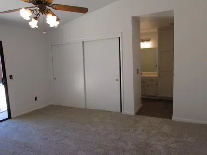 a bathroom with a sink and vanity