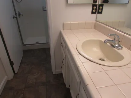 a view of a yard covered in snow