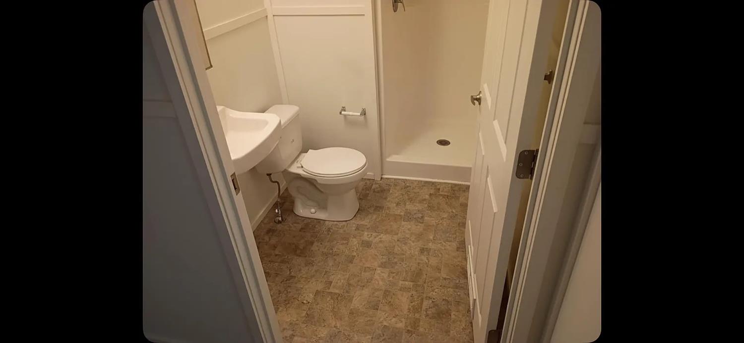 426 Stimpson Road Oroville, CA 95965 - Photo 10 of 16 a bathroom with a granite countertop toilet and a sink
