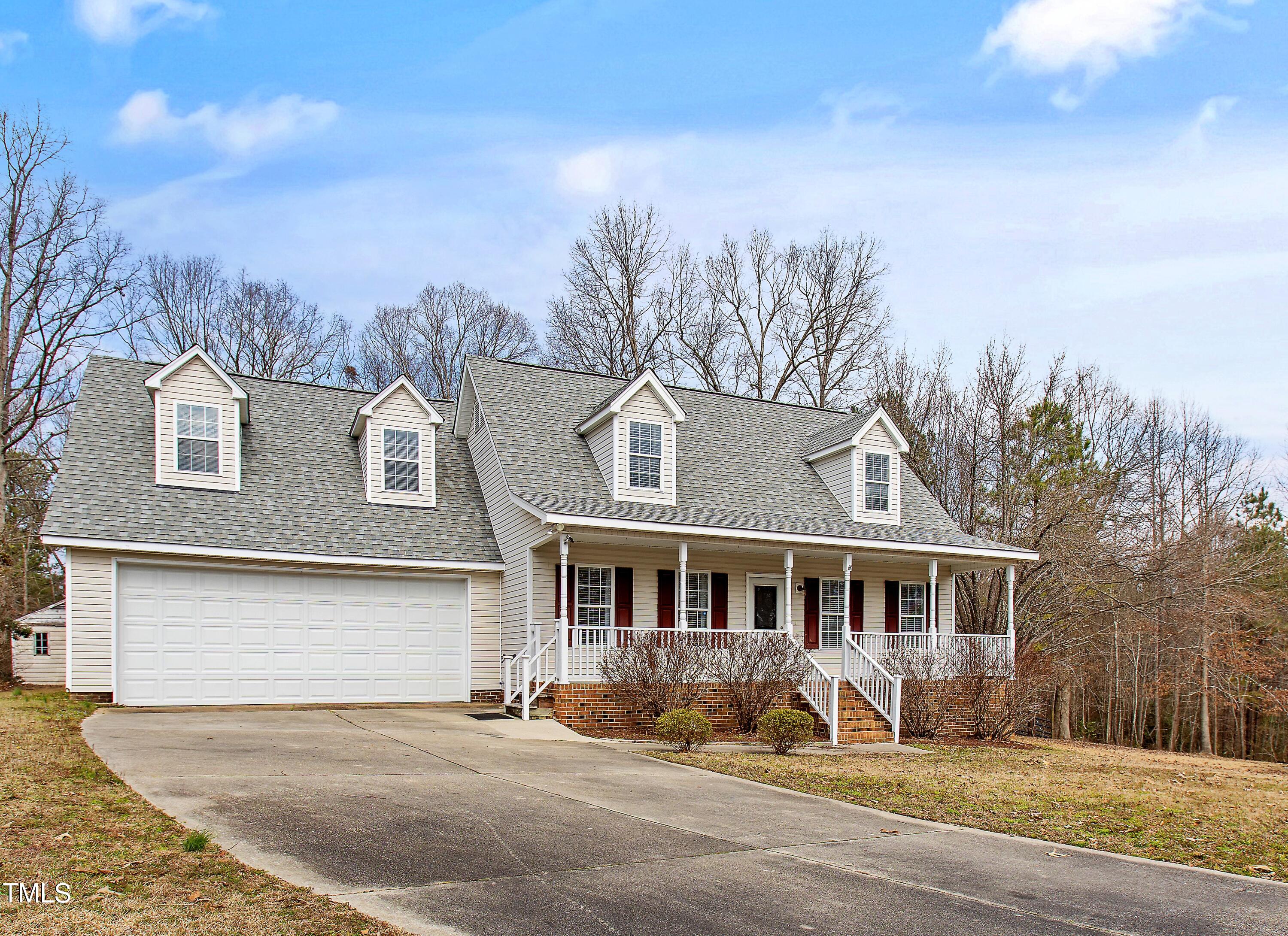 2000 Ruddy Road Raleigh, NC 27616 - Photo 1 of 20 a front view of a house with a yard