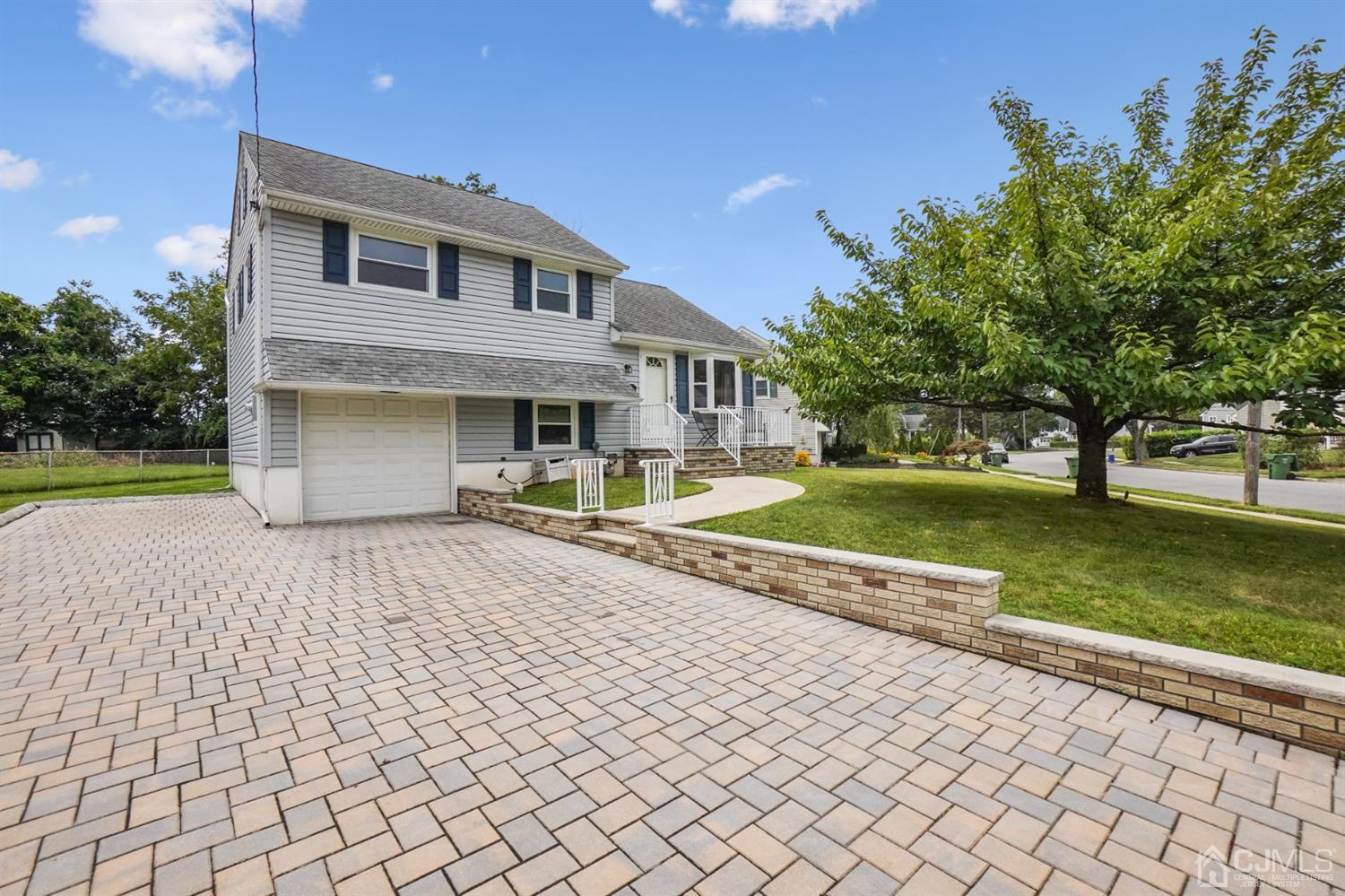 12 Leland Road Edison, NJ 08817 - Photo 1 of 23 a view of a house with a yard