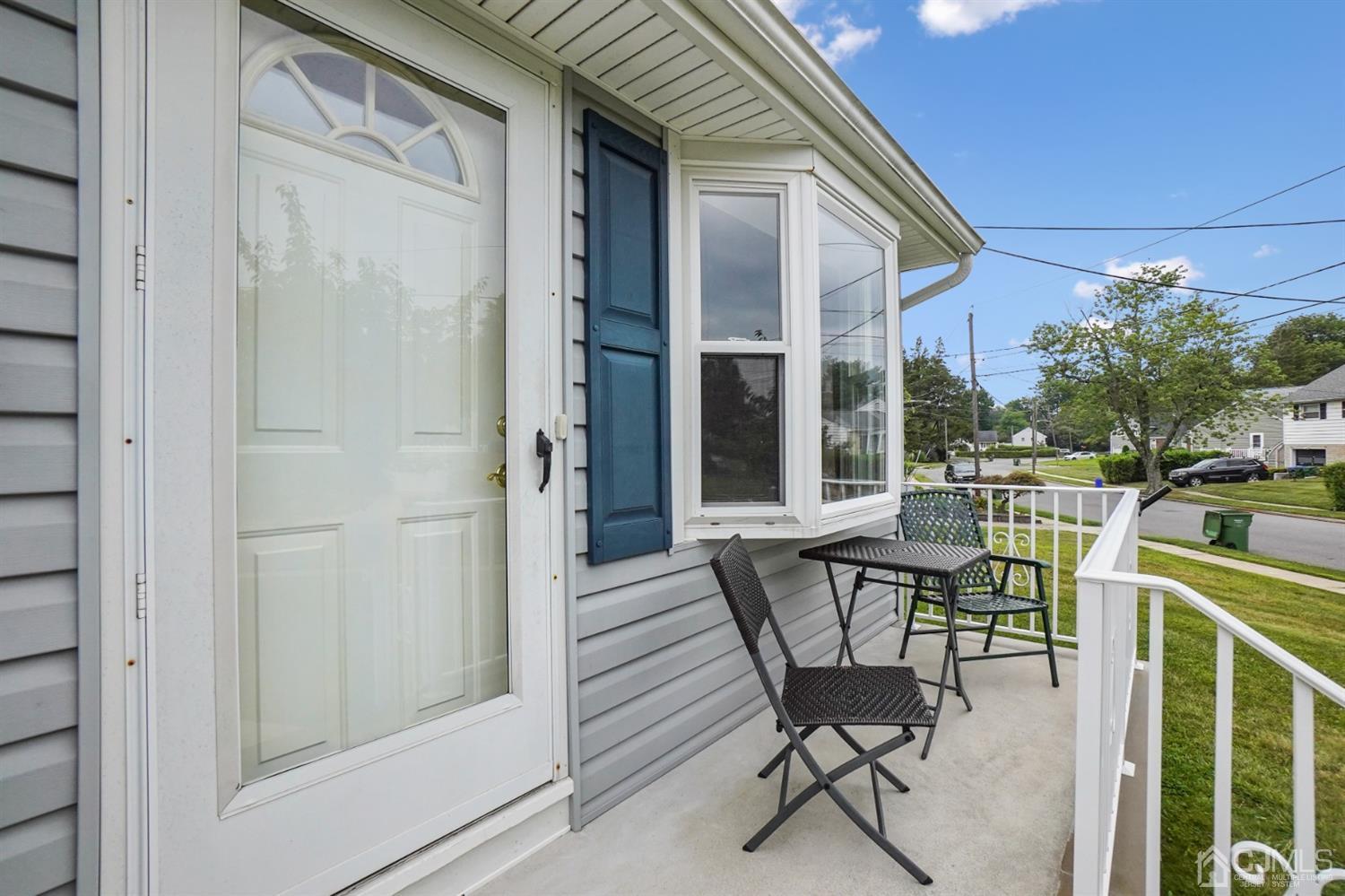 12 Leland Road Edison, NJ 08817 - Photo 3 of 23 a balcony with table and chairs