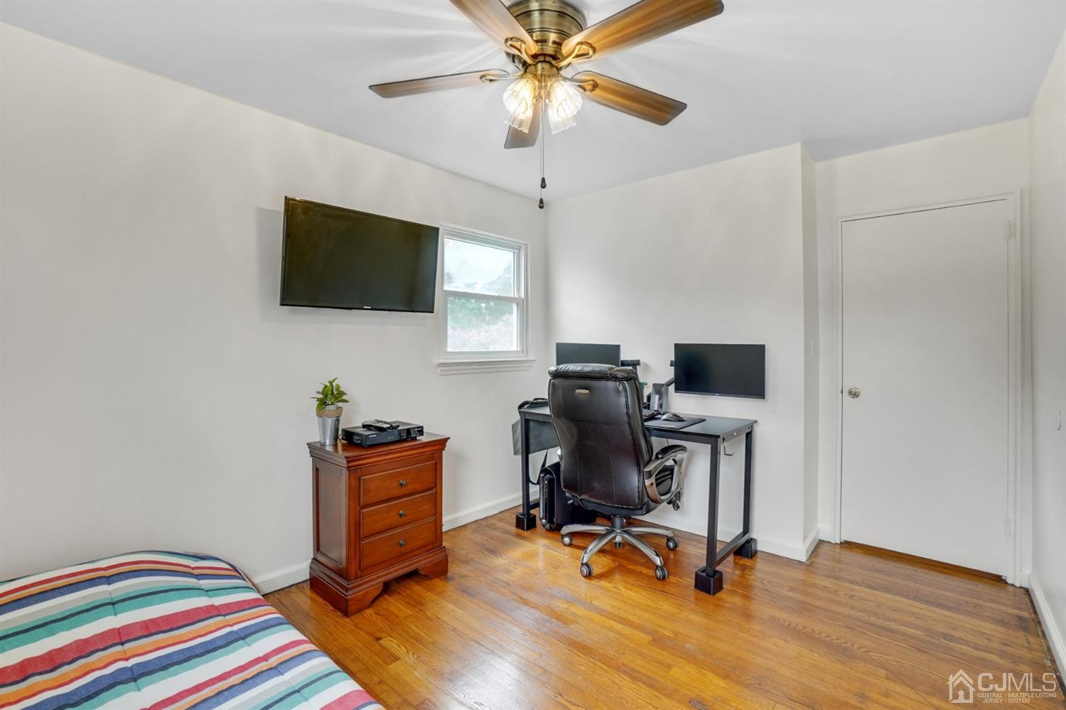 12 Leland Road Edison, NJ 08817 - Photo 21 of 23 a view of a workspace with furniture and a window