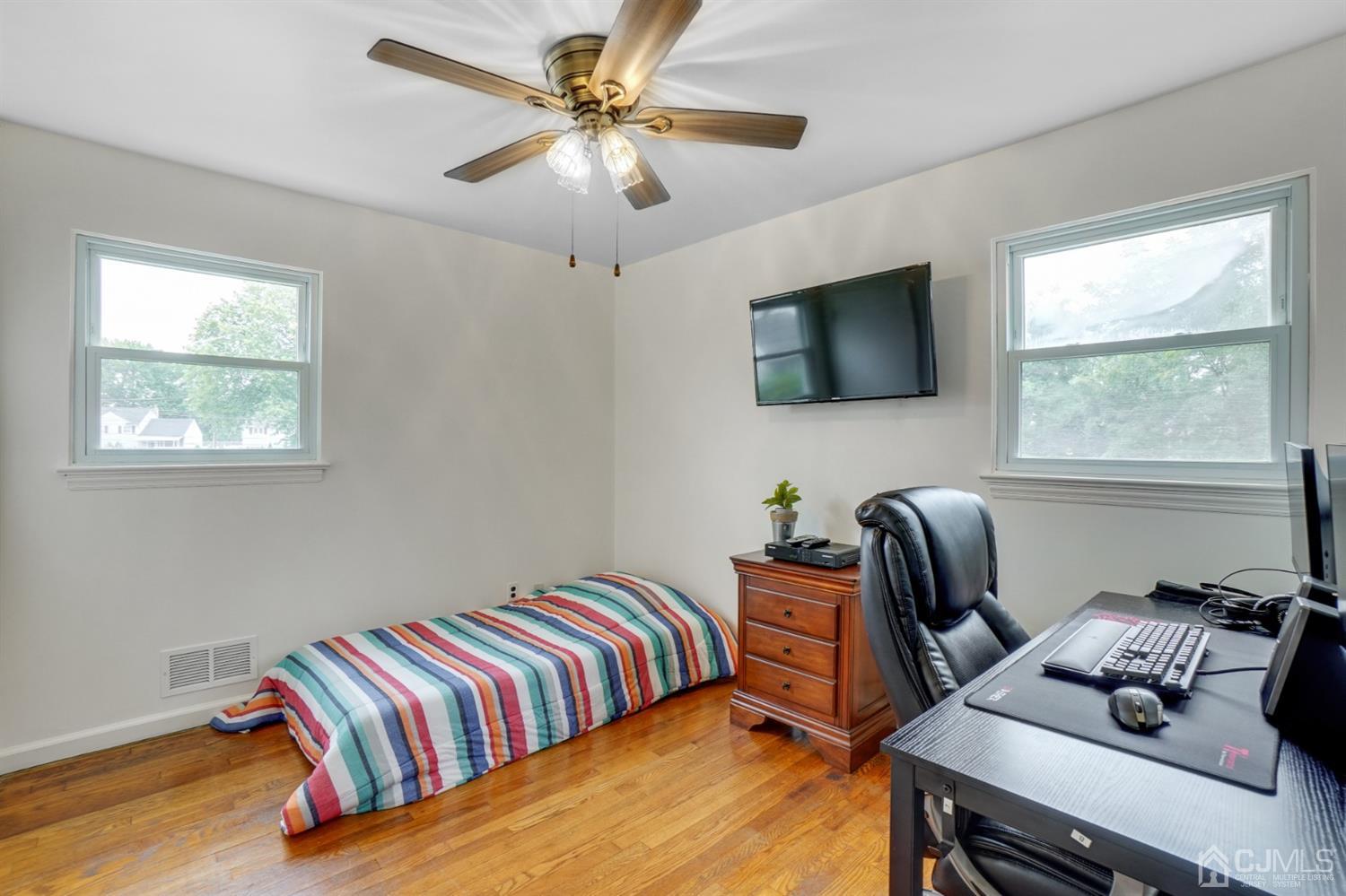 12 Leland Road Edison, NJ 08817 - Photo 22 of 23 a bedroom with a bed and a window