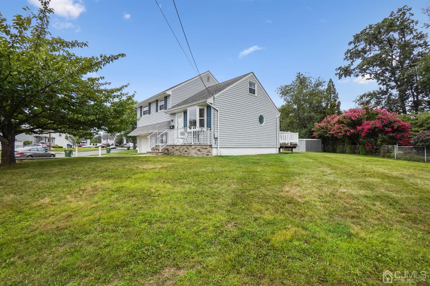12 Leland Road Edison, NJ 08817 - Photo 4 of 23 a view of a house with a yard