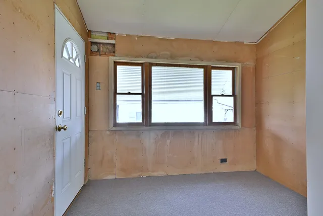 an empty room with windows