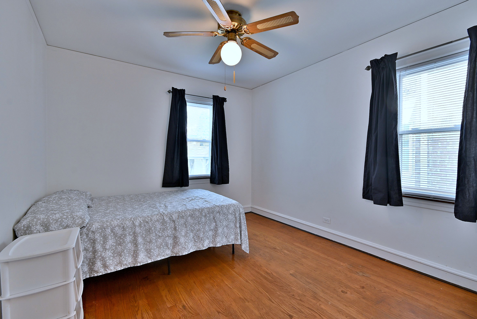 2852 North Meade Avenue Chicago, IL 60634 - Photo 15 of 31 a bedroom with a bed and a window
