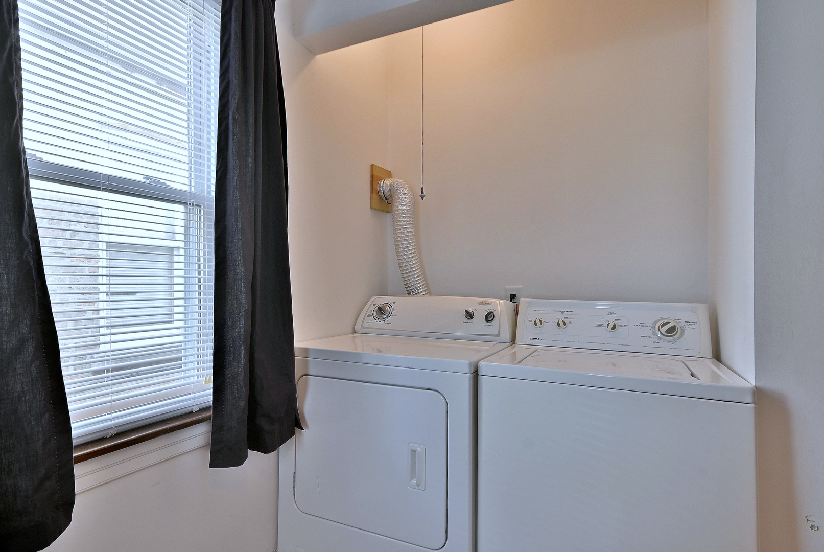 2852 North Meade Avenue Chicago, IL 60634 - Photo 19 of 31 a utility room with dryer and washer