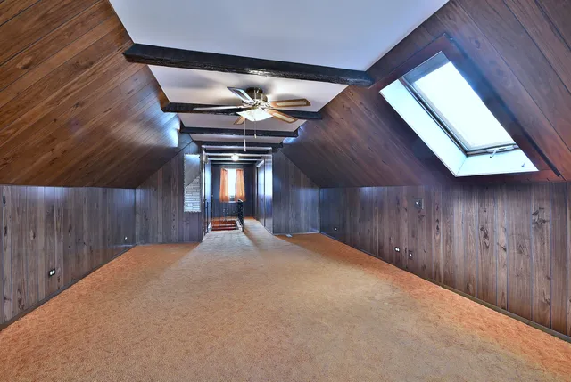 a big room with wooden walls