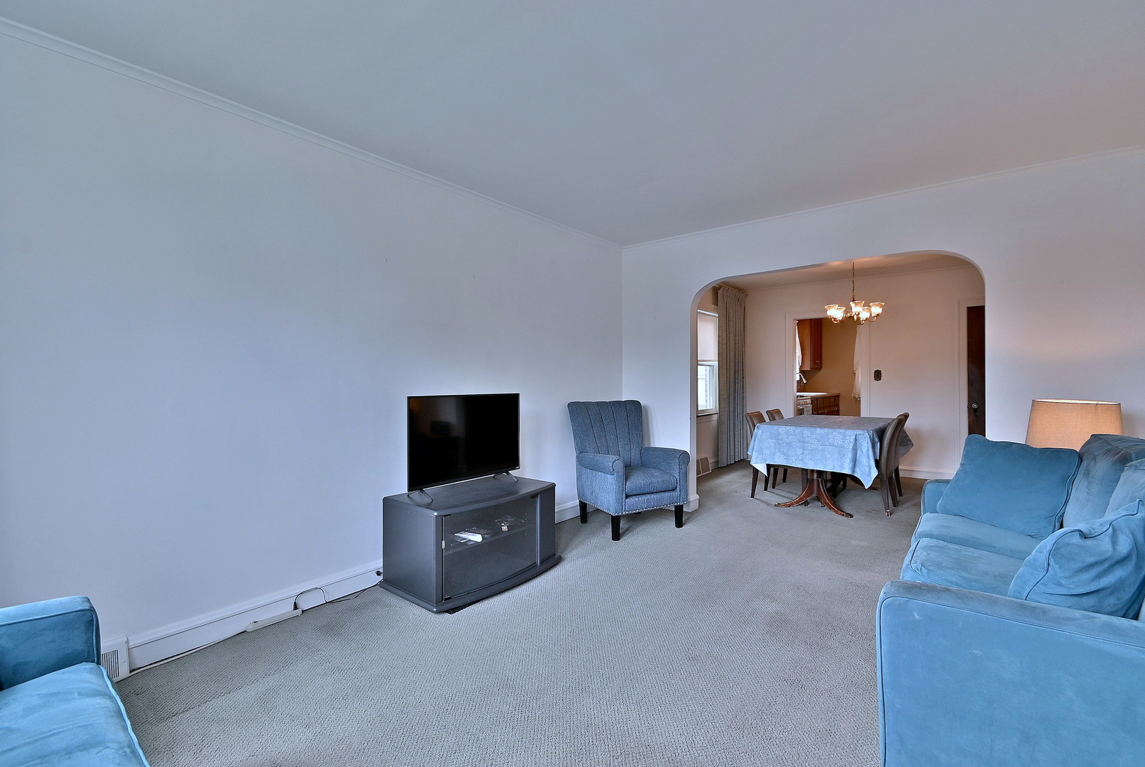 2852 North Meade Avenue Chicago, IL 60634 - Photo 3 of 31 a living room with furniture and a flat screen tv