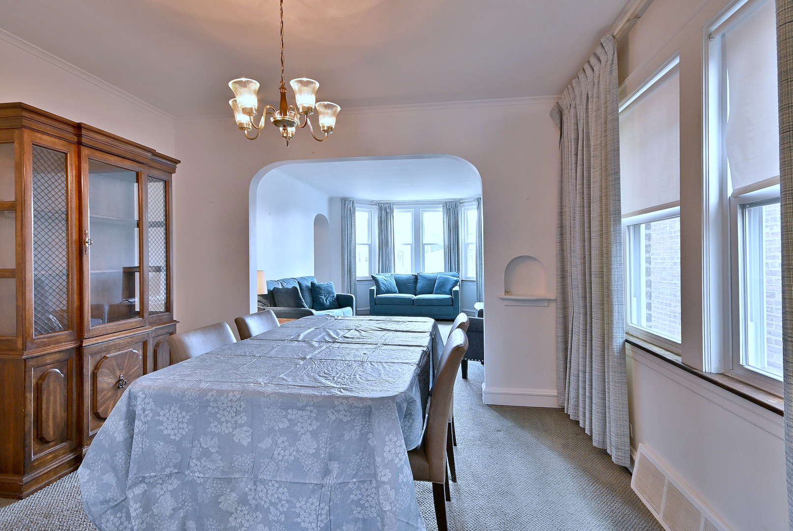 2852 North Meade Avenue Chicago, IL 60634 - Photo 7 of 31 a view of a dining room with furniture and a chandelier