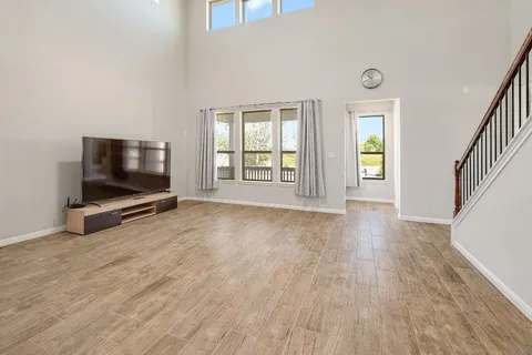 wooden floor and windows in a room