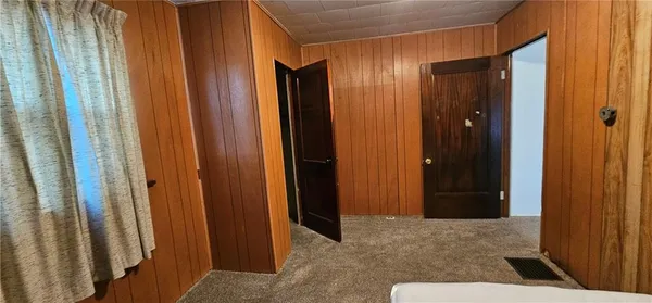 a room with furniture and closet