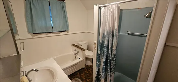 a room with water heater and a wooden table